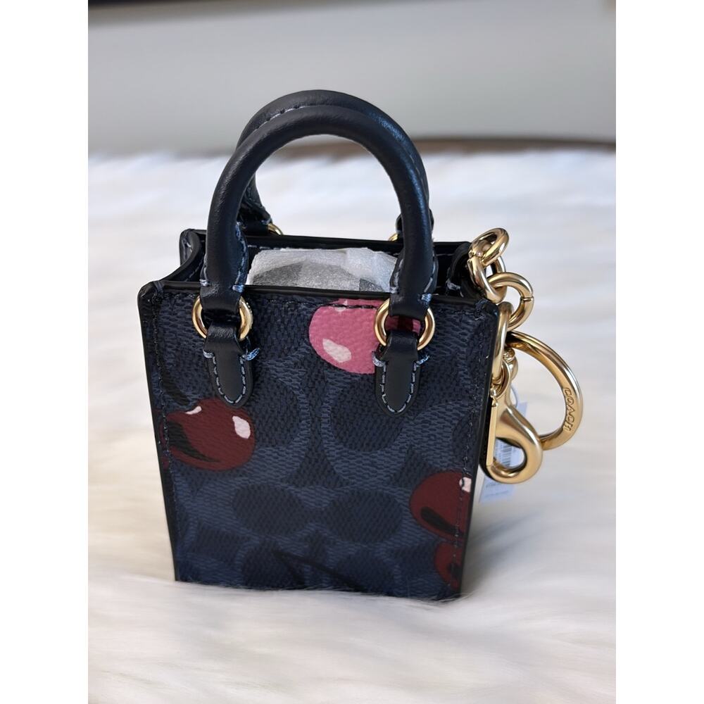 COACH North/South Mini Tote Bag Charm In Signature Canvas With Cherry Print - Picture 4 of 6